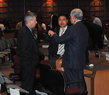 Delegates conversing after the session.