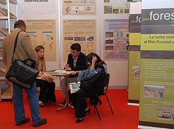 Delegates obtain information at one of the many conference booths.