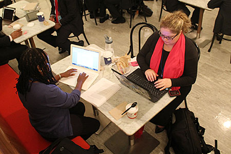 ENB's Dorothy Nyingi and Kate Louw working in the café