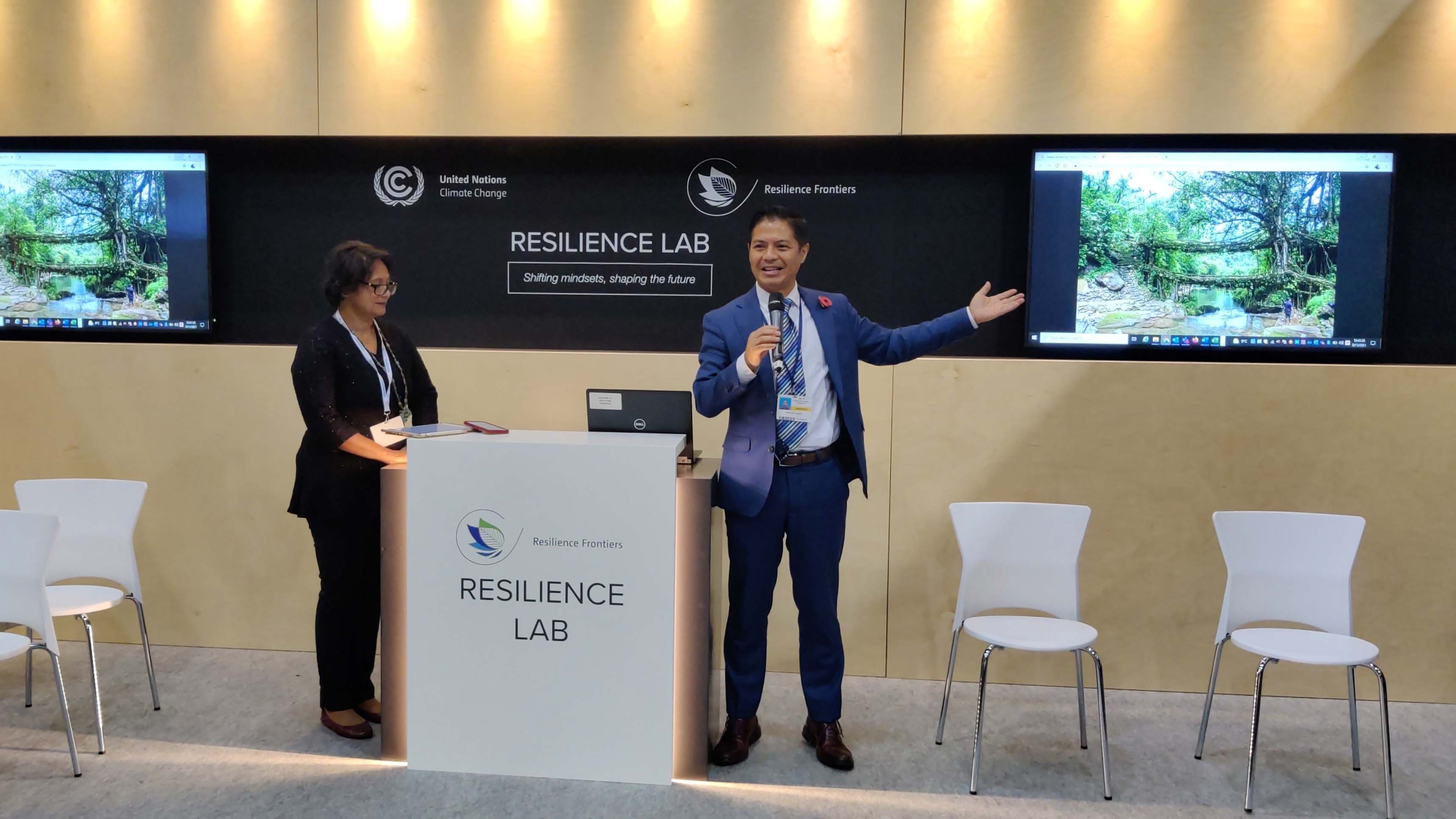 Bremley Lyngdoh, Founder and CEO of Worldview Impact (right), showcasing his ideas for a resilient future with Jyoti Mathur-Filipp, Director at the Convention on Biological Diversity Secretariat (left).