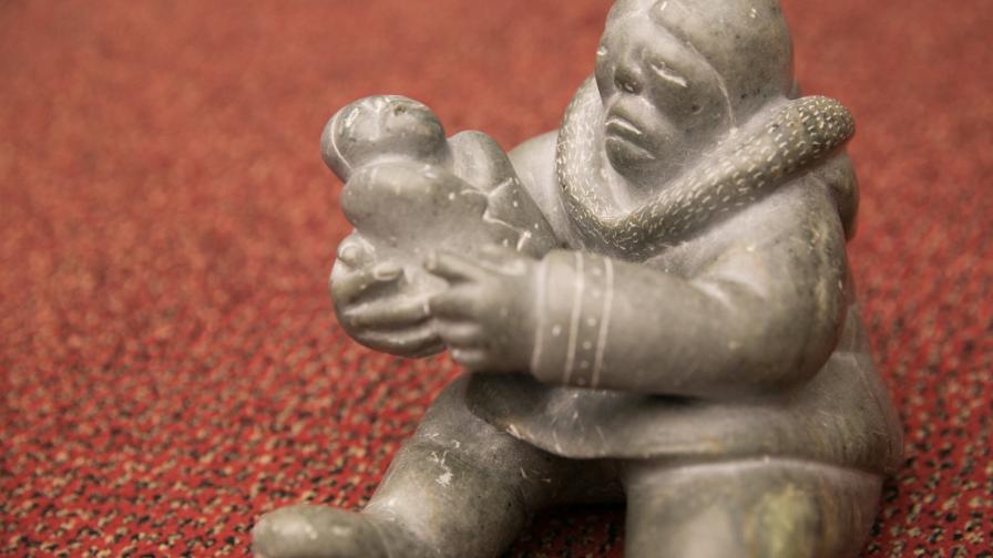 This Inuit carving of a mother and child, a gift of the Inuit Circumpolar Council to UNEP in 1999, is often displayed at Stockholm Convention meetings to remind participants of the significance of their work to protect human health and the environment. (photo from 2017 Conference of the Parties)