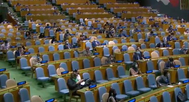 Delegates applaud the adoption of the Ministerial Declaration