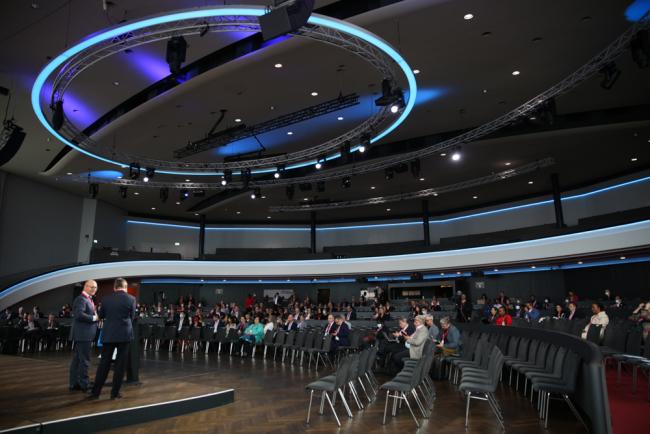 Delegates gather in plenary for various sessions throughout the day