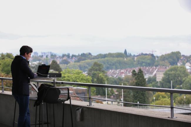 A delegate enjoys the view between sessions