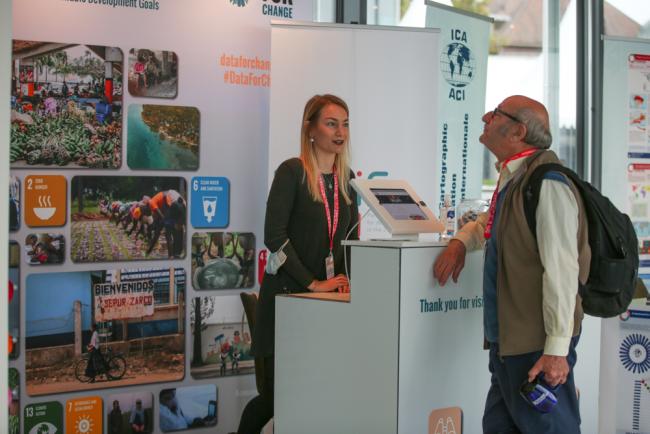 Delegates visit exhibition stands around the venue