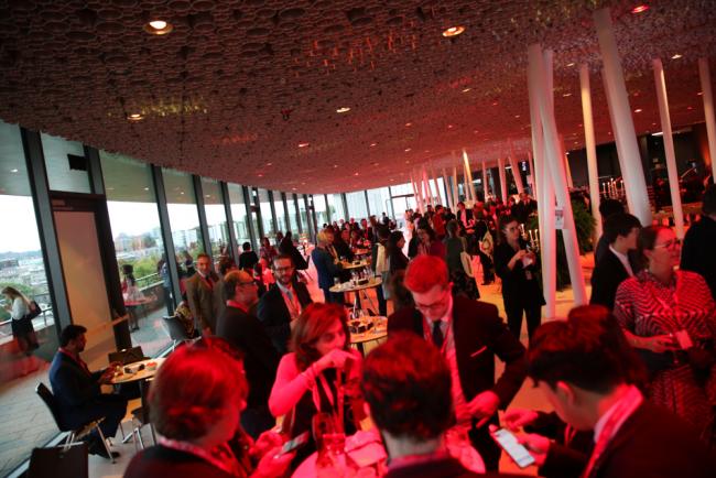 Delegates attend the opening reception 2