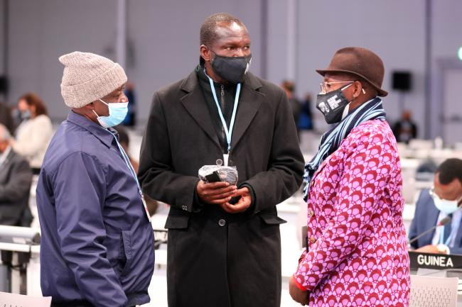 Delegates conferring during a break