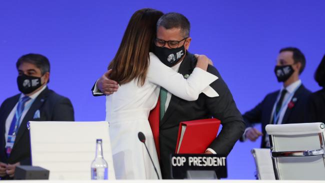   Carolina Schmidt, COP 25 President, Chile, handing over the presidency to Alok Sharma, COP 26 President, UK