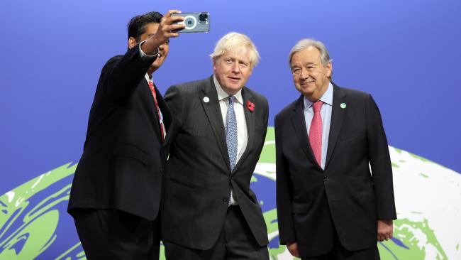 Surangel S. Whipps, Jr, President of Palau, taking a selfie with Boris Johnson, Prime Minister of the UK, and UNSG António Guterres