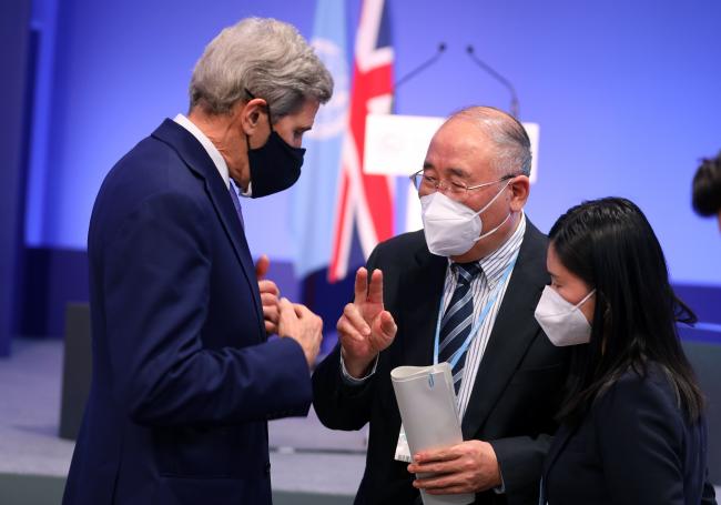 John Kerry, US Special Presidential Envoy for Climate, with Zhenhua Xie, Special Envoy for Climate Change, China