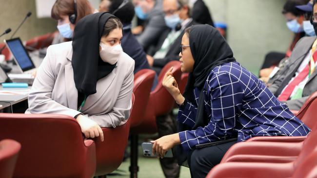 Delegates from the United Arab Emirates conferring