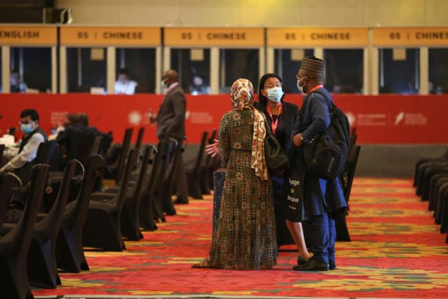 Delegates gather at the start of the day