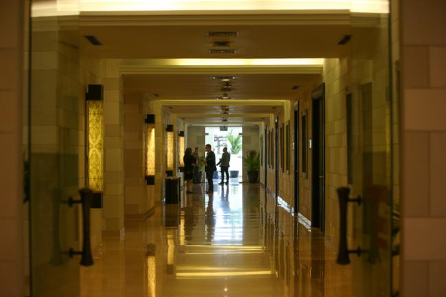 Delegates meet informally in the corridors of the venue