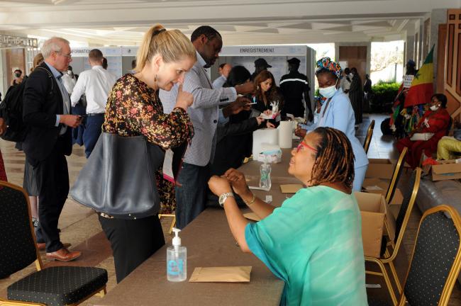 Participants take daily self covid tests before entering the venue.