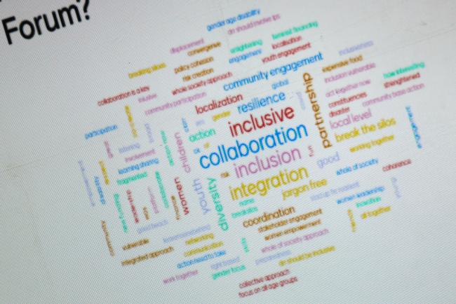 During the closing plenary, delegates share their key thoughts in a word cloud