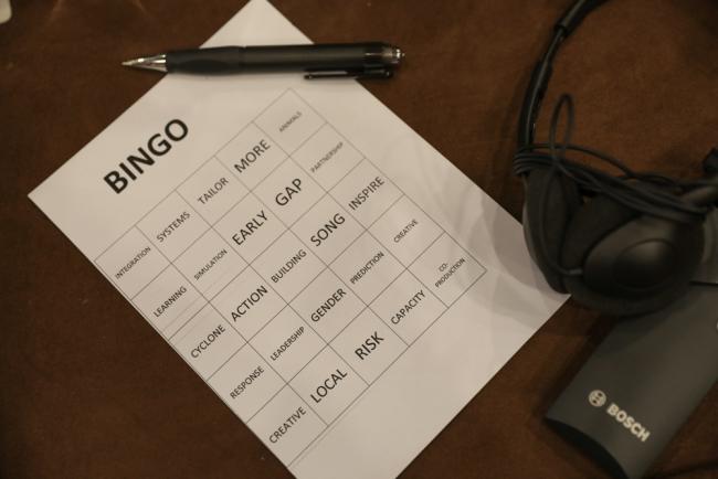 Delegates play bingo as part of an interactive exercise