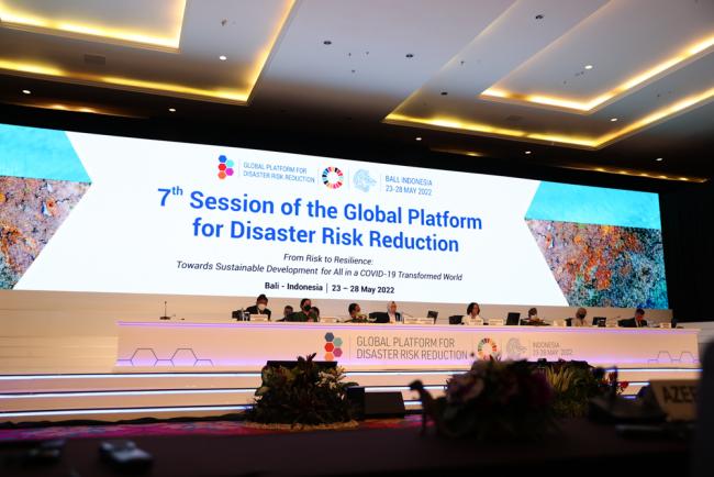 View of the dais during the Midterm Review Plenary: Beyond natural hazards – operationalising the expanded scope of the Sendai Framework