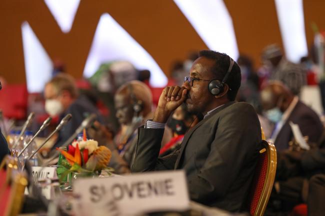 Delegates listen during the session