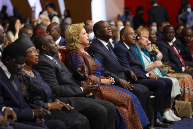 Dominique Claudine Ouattara, First Lady of Côte d'Ivoire, and Alassane Ouattara, President of Côte d'Ivoire, join dignitaries for the opening ceremony