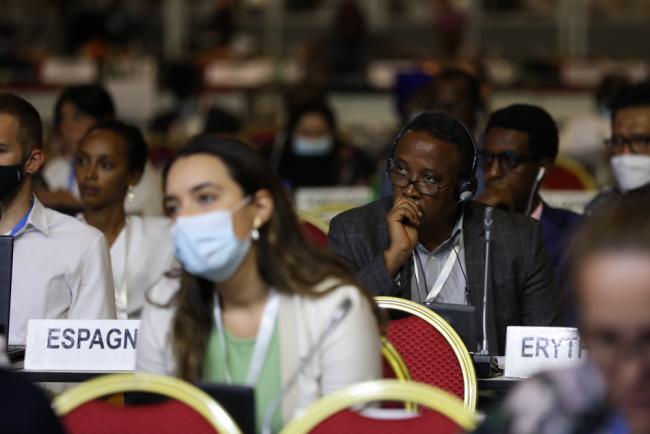 Delegates listen to the proceedings