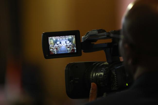 Media teams document the proceedings