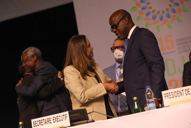 Andrea Meza Murillo, Deputy Executive Secretary, UNCCD, congratulates Alain-Richard Donwahi, COP 15 President