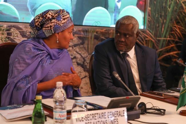 Amina J. Mohammed, Deputy Secretary-General of the UN, speaks with Moussa Faki Mahamat, Chairperson, AU Commission