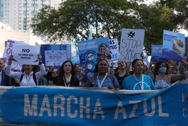 As the discussions continue for their third day, members of the public take to streets of Lisbon to 'march for the blue', calling for swifter and stronger action to be taken to address the crisis of the oceans