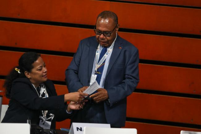 Margo Deiye, Permanent Representative of Nauru to the UN, speaks with Max Hufanen Rai, Permanent Representative of Papua New Guinea to the UN