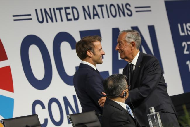 On the penultimate day of the UN Ocean Conference, Emmanuel Macron, President of France, greets Marcelo Rebelo de Sousa, President of Portugal, during the plenary session
