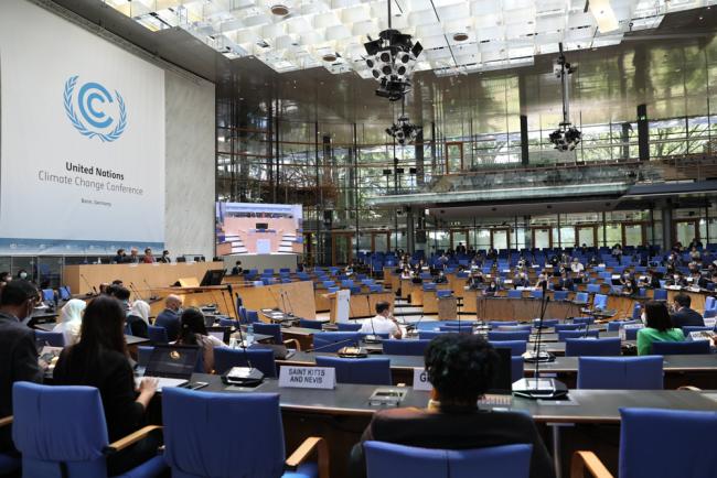 Delegates during the informal consultations on the work programme for mitigation