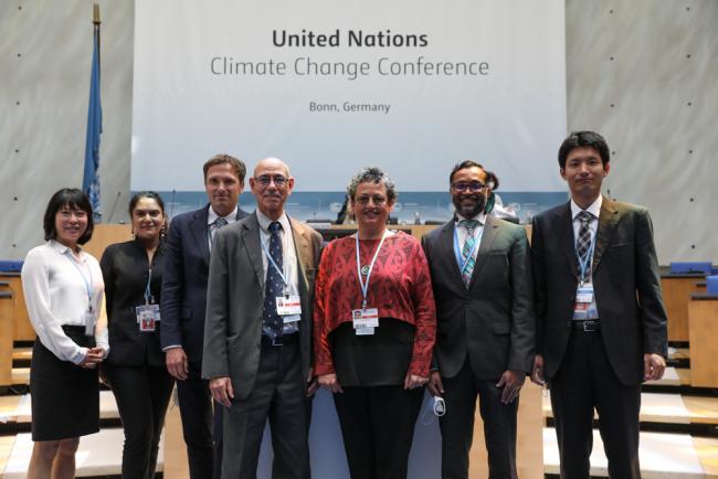Co-Facilitators and UNFCCC Secretariat working on the work programme for mitigation