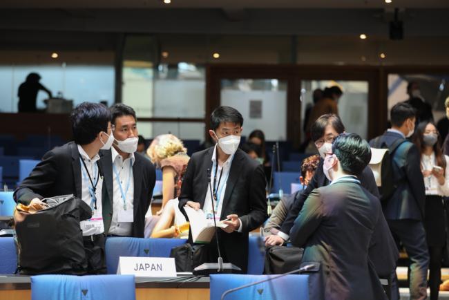 Delegates from Japan consult