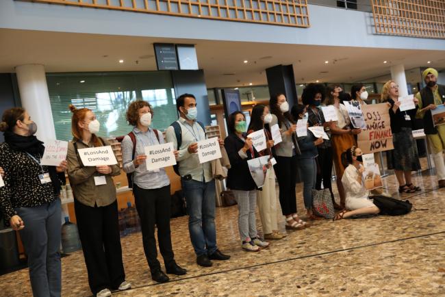 Before the start of the Glasgow Dialogue, civil society demonstrates in front of the Chamber Hall and the breakout groups, urging delegates for more finance to address loss and damage