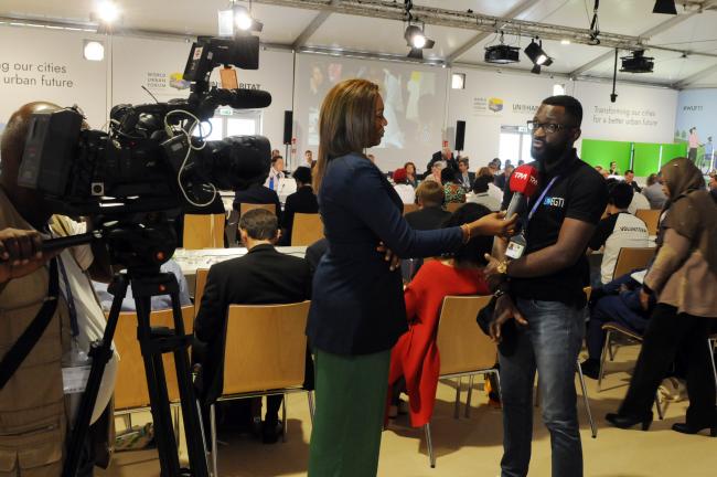 A participant is interviewed during the event.