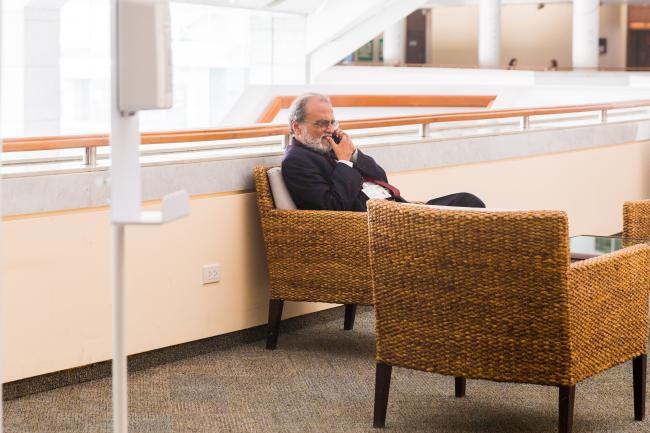 A delegate on a call during the lunch break - OEWG-44/ExMOP-5 - 11Jul2022  - photo 