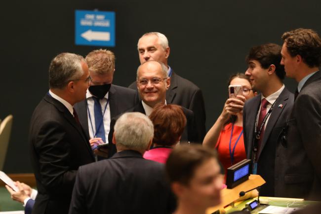 Delegates speak informally