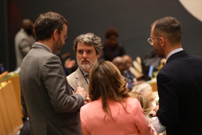 Delegates speak informally