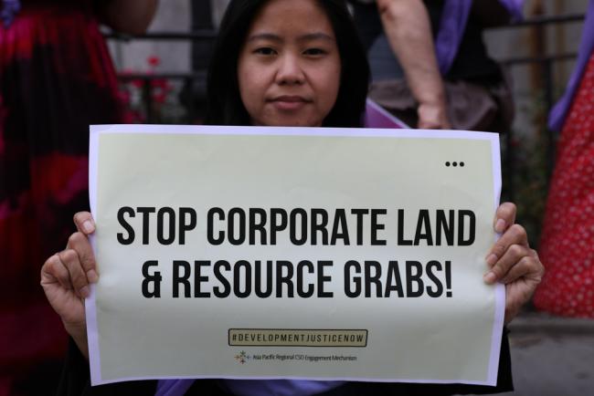 Stop corporate land and resource grabs