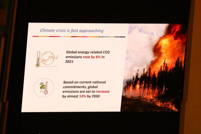 A slide highlights the urgency of addressing the climate crisis