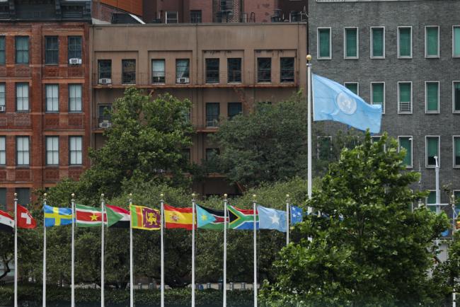 Flags fly outside UN headquarters as the second week of HLPF 2022 begins