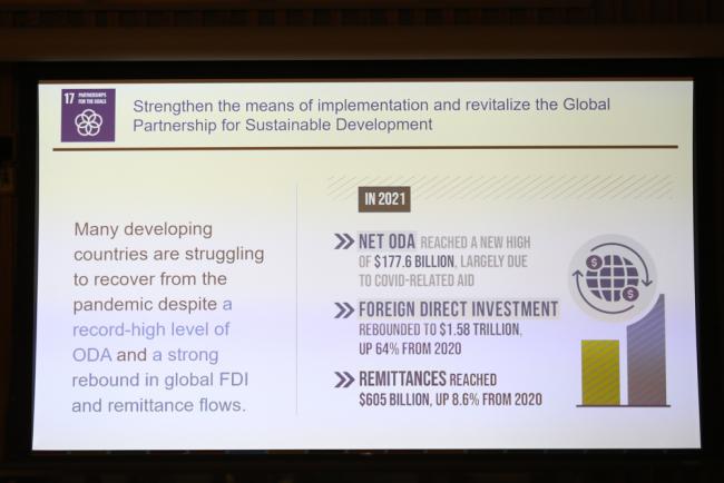 A slide highlights the impacts of COVID-19 on foreign direct investment