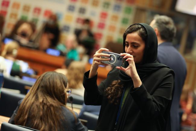 Delegates take photos throughout the day