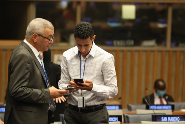 Delegates speak informally