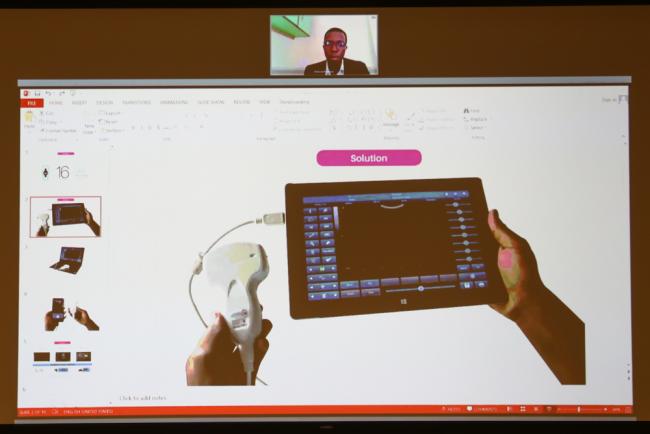 Innocent Menyo, Mobile Scan Solutions Uganda, presents on their mobile ultrasound device to detect pregnancy complications in low-resources settings in Uganda
