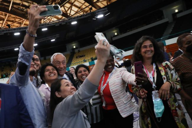 Marcelo Rebelo de Sousa, President of Portugal, takes a selfie with delegates