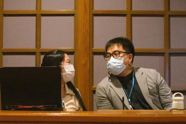 conference officers chatting - OEWG-44-ExMOP-5 - 11Jul2022 - photo_-2.jpg