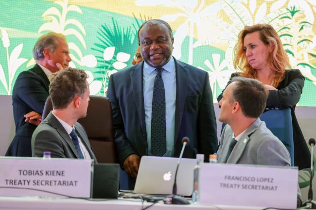 Members of the ITPGRFA Secretariat conferring during a break