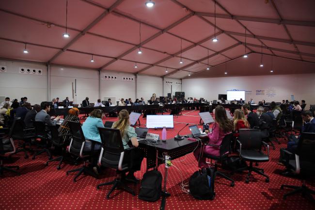 View of the room during informal consultations on the impact of the implementation of response measures