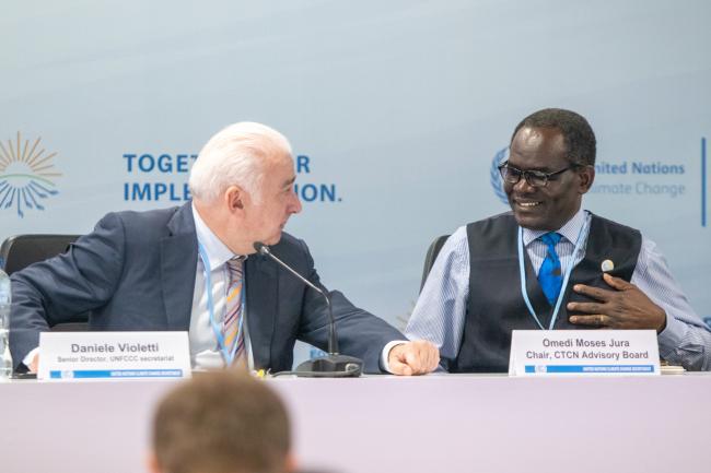 Daniele Violetti and Omedi Moses Jura